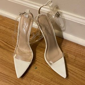 Pointed white heels